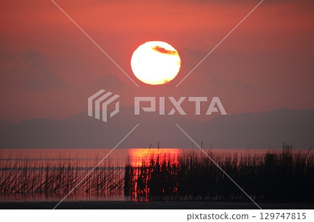 Arao City coast at dusk 129747815