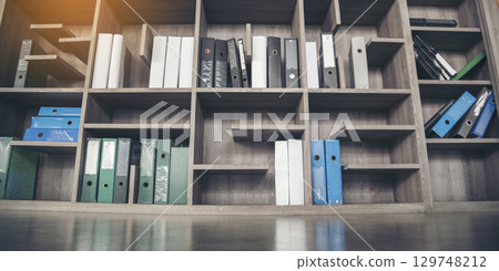 Blurry Library background off white Backdrop bright softness bookshelf with copy space. Book case Blurred background bright library silver gray lighting. defocused store light bokeh in design 129748212
