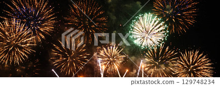 Banner Golden Firework celebrate anniversary independence day night time celebrate national holiday. Countdown 2024 party time event. Happy new year 2025 4th of july holiday festival with copy space 129748234