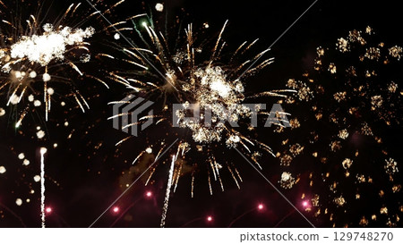 Golden Firework celebrate anniversary independence day night time celebrate national holiday. Countdown to new year 2024 party time event. Happy new year 2025, 4th of july holiday festival concept 129748270