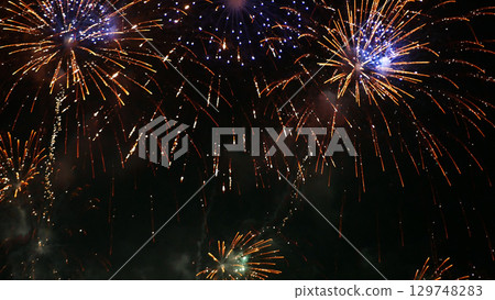 Golden Firework celebrate anniversary independence day night time celebrate national holiday. Countdown to new year 2024 party time event. Happy new year 2025, 4th of july holiday festival concept 129748283