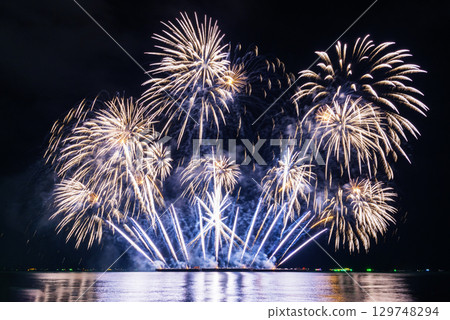 Blue Firework celebrate anniversary happy new year 2024, 4th of july holiday festival. blue firework in night time celebrate national holiday. Countdown to new year 2025 festival party time event Blue Firework celebrate anniversary happy new year 2024, 4th of july holiday festival. blue firework in night time celebrate national holiday. Countdown to new year 2025 festival party time event 129748294