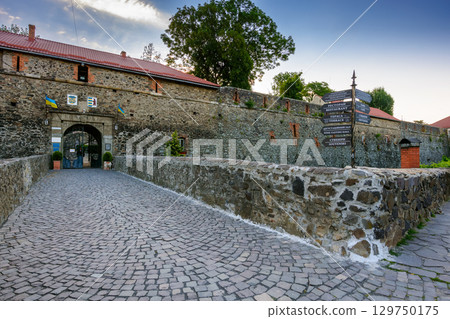 uzhhorod, ukraine - 11 jun, 2017: old castle architecture of europe. uzhhorod stronghold is a popular landmark in transcarpathia, ukraine. urban scenery on summer morning uzhhorod, ukraine - 11 jun, 2017: old castle architecture of europe. uzhhorod stronghold is a popular landmark in transcarpathia, ukraine. urban scenery on summer morning 129750175