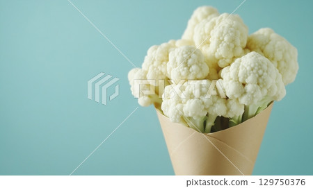 Cauliflower vegetable on brown paper grocery cone bag eco friendly package 129750376