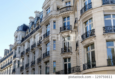 The Elegant and Iconic Parisian Architecture Enhanced by Beautiful Classic Balconies The Elegant and Iconic Parisian Architecture Enhanced by Beautiful Classic Balconies 129750811