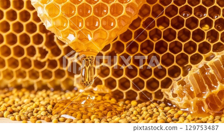 Fresh honeycomb with dripping honey and bee pollen 129753487