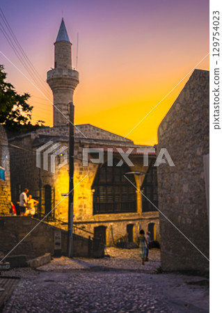 A photo of a street corner in Kyrenia at sunset in the Turkish Republic of Northern Cyprus A photo of a street corner in Kyrenia at sunset in the Turkish Republic of Northern Cyprus 129754023