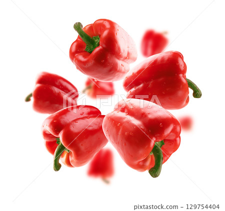 Red paprika levitates on a white background Red paprika levitates on a white background 129754404