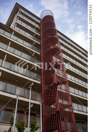 Spiral staircase outside the apartment Spiral staircase outside the apartment 129754531