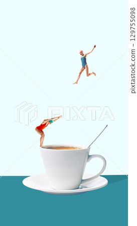 Contemporary collage. Two women divers in swimsuits jumping into coffee cup with spoon on blue background. 129755098