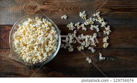 Popcorn on wood color background.Food and snack concepts ideas.Minimal style top view mockup 129756074