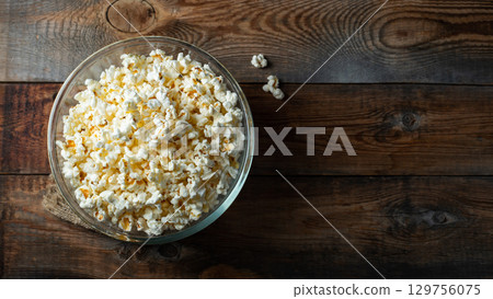 Popcorn on wood color background.Food and snack concepts ideas.Minimal style top view mockup 129756075