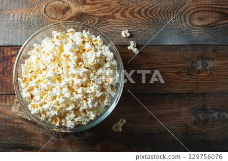 Popcorn on wood color background.Food and snack concepts ideas.Minimal style top view mockup 129756076