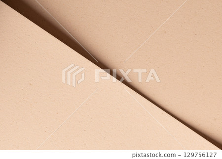 Beige designer paper texture with sandy, minimalistic backdrop. Modern, premium surface with matte Beige designer paper texture with sandy, minimalistic backdrop. Modern, premium surface with matte 129756127