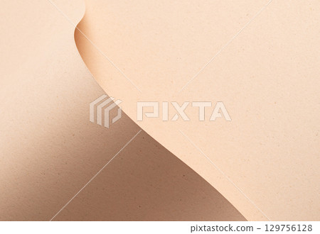 Beige designer paper texture with sandy, minimalistic backdrop. Premium, chic sheet with wave fold, Beige designer paper texture with sandy, minimalistic backdrop. Premium, chic sheet with wave fold, 129756128