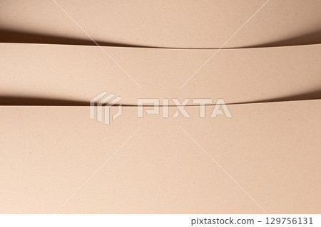 Beige sandy paper texture backdrop. Premium, chic designer paper with a matte finish. Modern, trendy 129756131