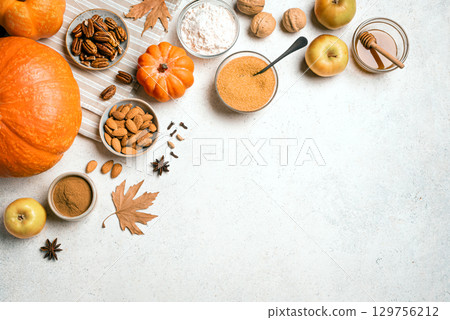 Autumn fall baking background with pumpkins and ingredients 129756212
