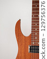 Wooden Electric Guitar Detail Close-up 129756376