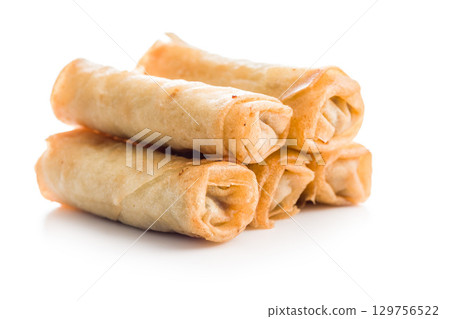 Fried spring rolls isolated on white background. Fried spring rolls isolated on white background. 129756522