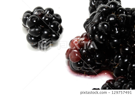 Close up of blackberries fruit on a white background 129757491