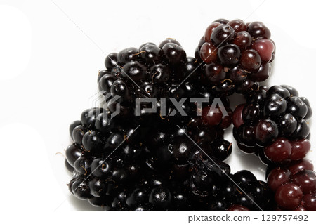 Close up of blackberries fruit on a white background 129757492