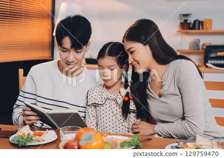 Family spends their free time together 129759470