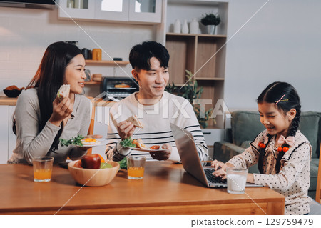 Family spends their free time together 129759479