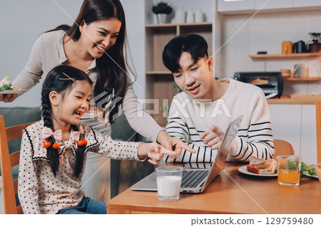 Family spends their free time together 129759480
