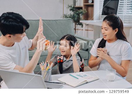 Family spends their free time together 129759549