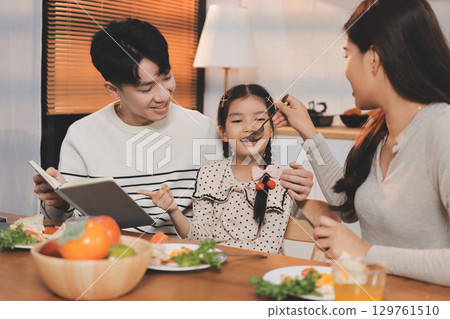 Family spends their free time together 129761510