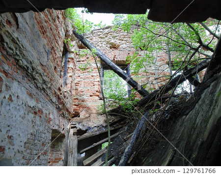 The building is old and has a lot of damage The building is old and has a lot of damage 129761766