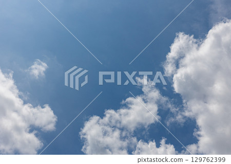 Refreshing summer cumulonimbus clouds and blue sky Refreshing summer cumulonimbus clouds and blue sky 129762399