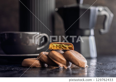 Dubai style chocolate cookies on black table. 129762433