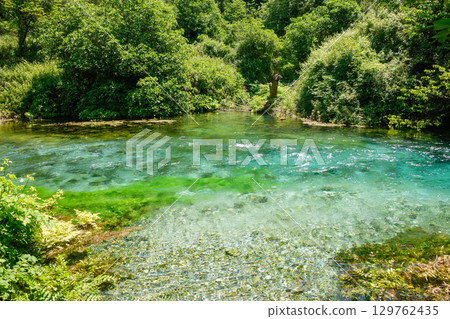 clear water and forest in Blue Eye Nature Monument near to Saranda, Albania clear water and forest in Blue Eye Nature Monument near to Saranda, Albania 129762435