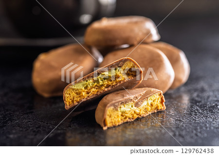 Dubai style chocolate cookies on black table. Dubai style chocolate cookies on black table. 129762438