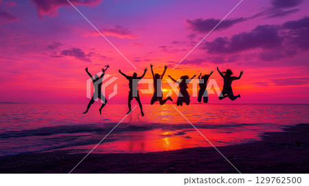 Friends jumping at the beach at sunset: A touching moment of youth and friendship Friends jumping at the beach at sunset: A touching moment of youth and friendship 129762500