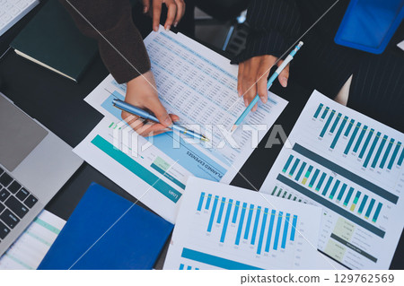 Success, audience with an applause and in a business meeting at work with a lens flare together. Achievement or celebration, motivation and businesspeople clapping hands for good news or support 129762569
