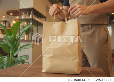 Blank craft delivery paper bag with handle mockup, ai generated 129762708