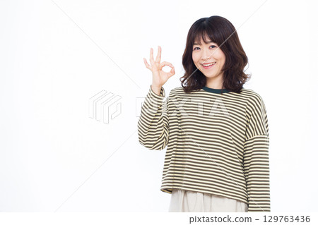 Woman signing OK Woman signing OK 129763436