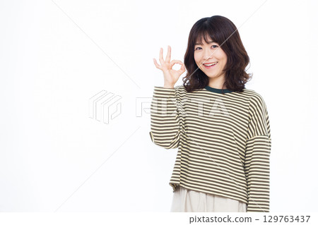 Woman signing OK Woman signing OK 129763437