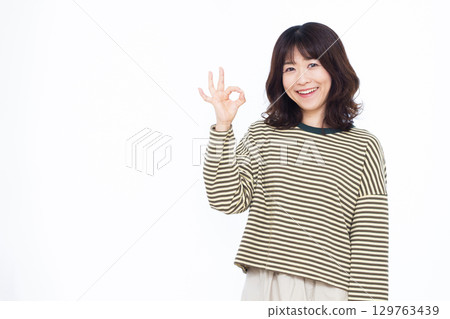 Woman signing OK Woman signing OK 129763439