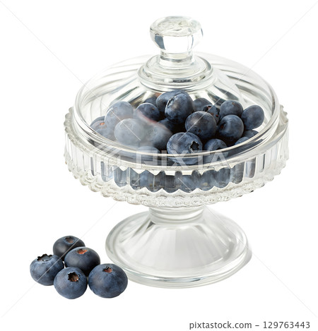 Fresh blueberries in vintage glass jar with lid, healthy snack isolated on transparent background 129763443