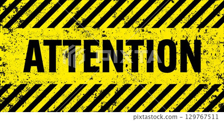 Warning sign with yellow and black diagonal lines. Attention, danger or caution symbol. Construction site signage, road safety notice, hazard banner, security alert shield. Vector illustration 129767511