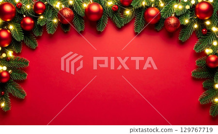 Festive Christmas frame with fir branches, red balls, and other winter holiday decorations Festive Christmas frame with fir branches, red balls, and other winter holiday decorations 129767719
