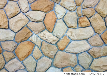 Sand stone wall for usage as background. 129769417
