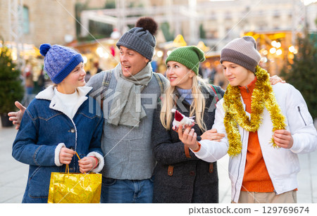 Portrait of a happy European family an Christmas fair 129769674