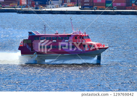 An exhilarating ride across the ocean... A Jetfoil gliding through Tokyo Port An exhilarating ride across the ocean... A Jetfoil gliding through Tokyo Port 129769842
