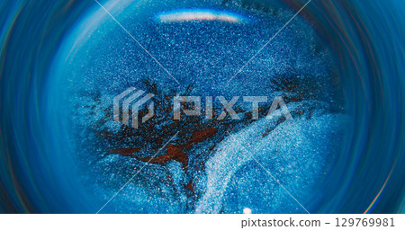 Blur ink flow. Pigment mix. Defocused blue golden color shiny round texture circling on abstract creative acrylic light background. Blur ink flow. Pigment mix. Defocused blue golden color shiny round texture circling on abstract creative acrylic light background. 129769981