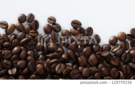 Coffee beans on white background Coffee beans on white background 129770156