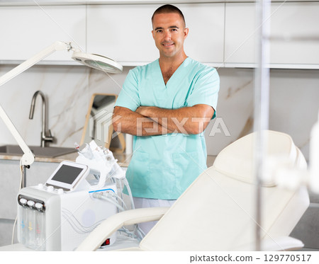 physician standing 129770517